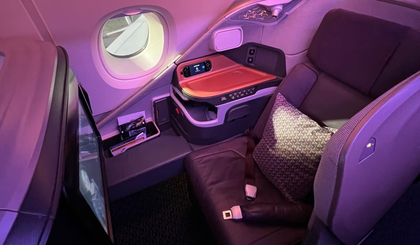Spacious seat in business class on an airplane